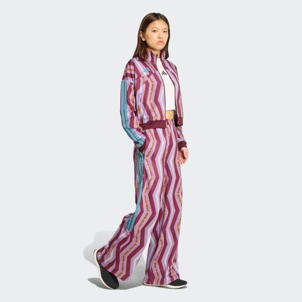 Czerwony Spodnie dresowe adidas x FARM Tiro