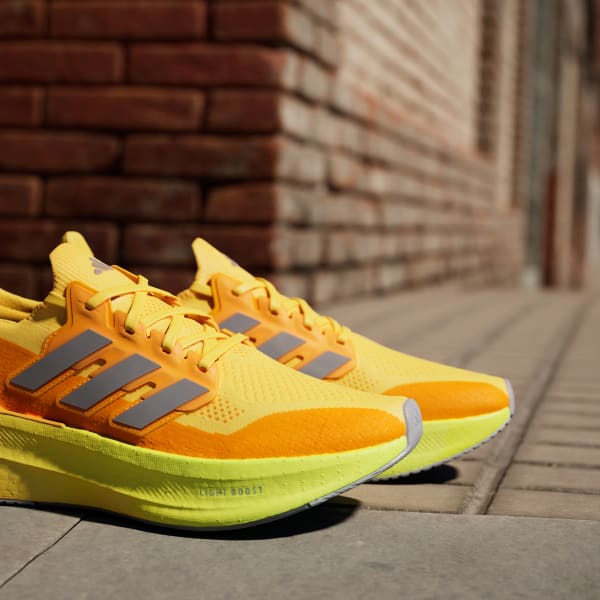 Adidas shoes in orange colour on sale