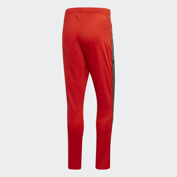 red tiro pants