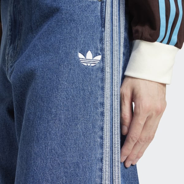 あ　アディカラー　デニム　ファイヤーバードパンツ adidas（アディダス）の「アディカラー デニム ファイヤーバード