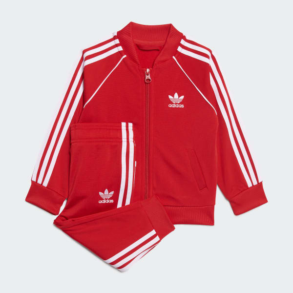 Saturar bombilla Frente Conjunto chaqueta y pantalón Adicolor SST - Rojo adidas | adidas España