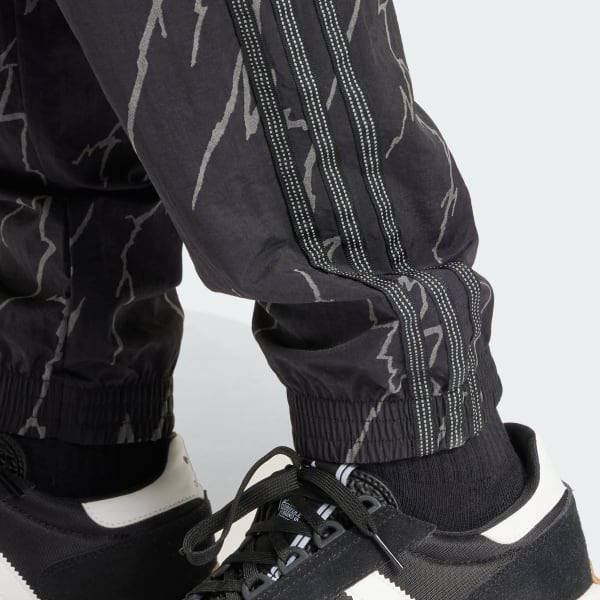 adidas Allover Print SST Track Pants - Black | adidas Switzerland