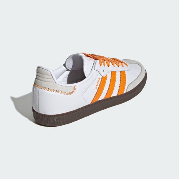 Adidas slip on orange new arrivals