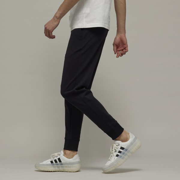 black adidas track pants