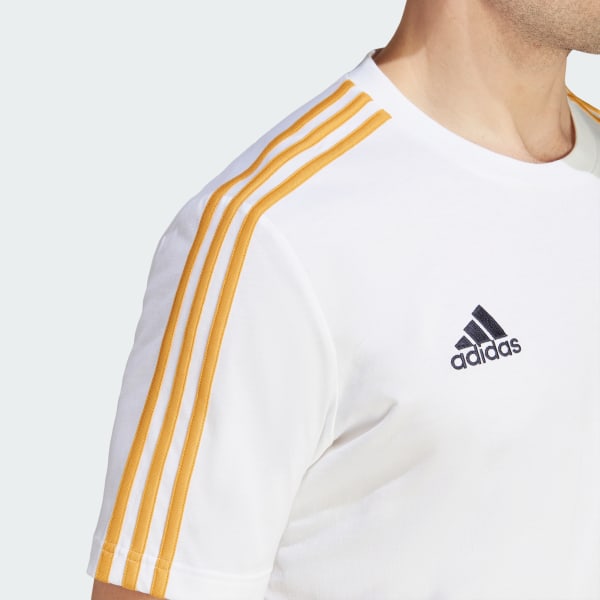 Adidas white and top gold t shirt