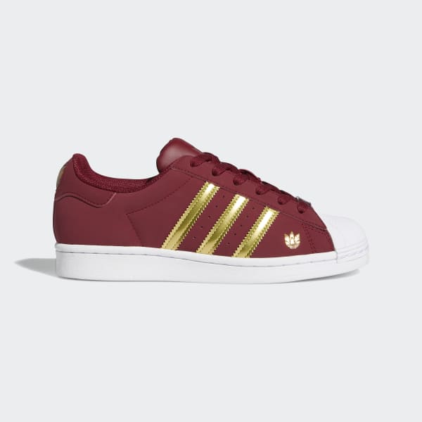 maroon and gold adidas shoes