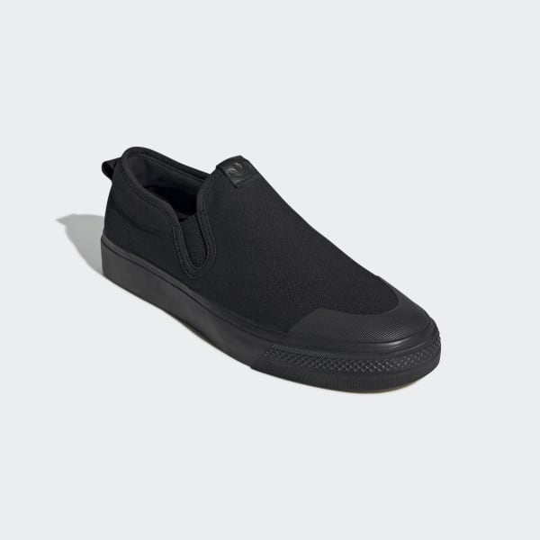 slip on black canvas shoes