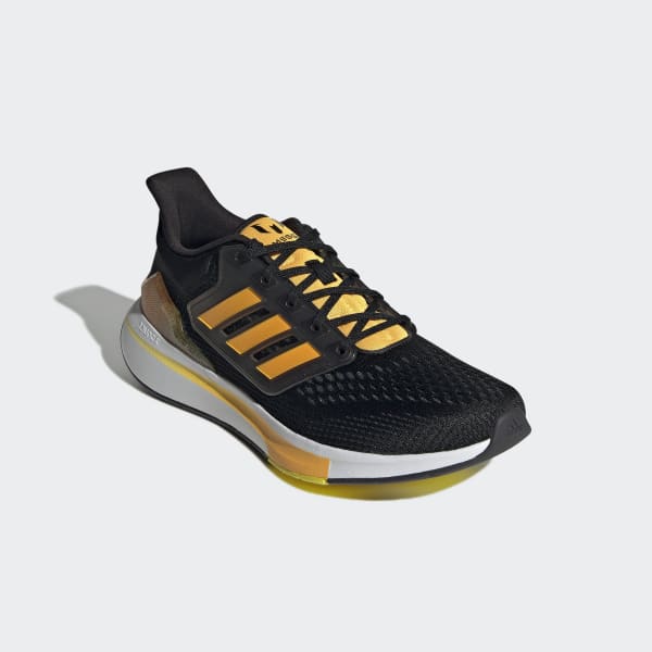 black and gold adidas tennis shoes