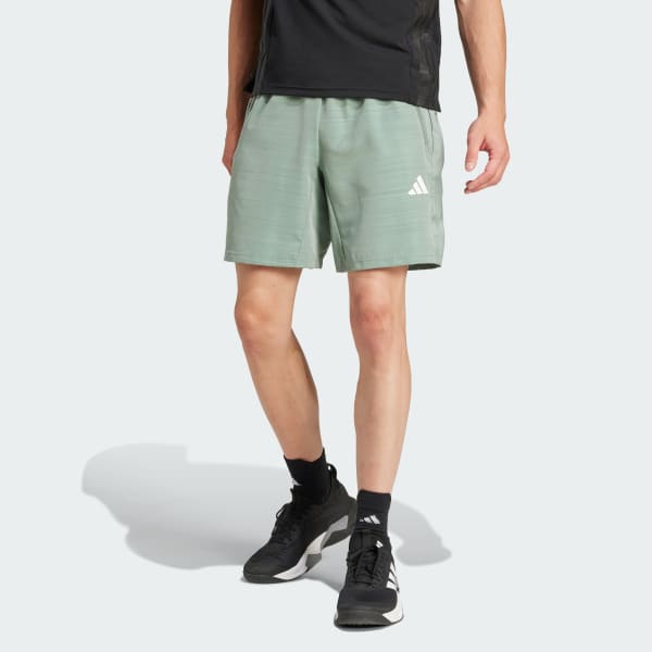 Verde Shorts Train Essentials Woven jaspeado