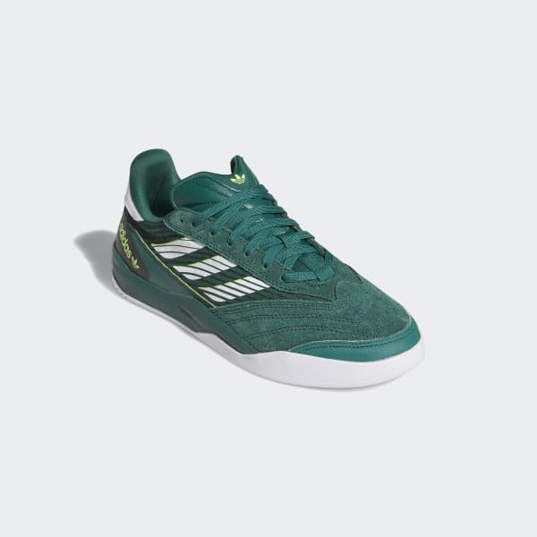 green and white adidas shoes
