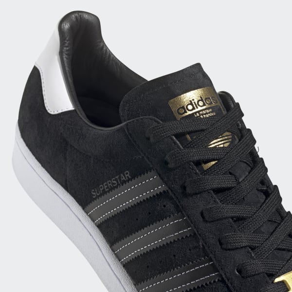 adidas black and gold trainers
