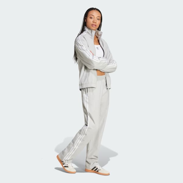 グレー アディダス オリジナルス ウーブントラックトップ