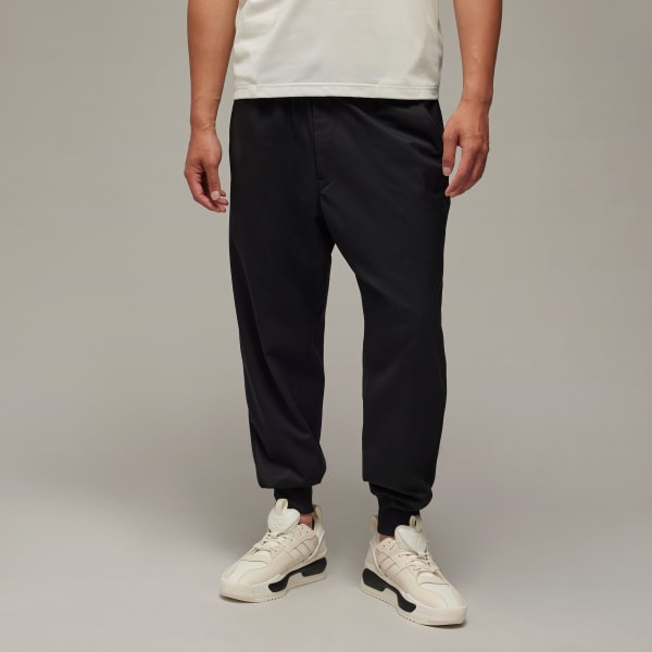 Adidas originals woven cuffed track pants store