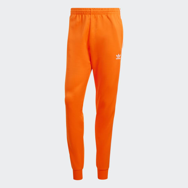 Adidas orange sst track pants 2025