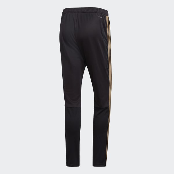 black and gold tiro pants