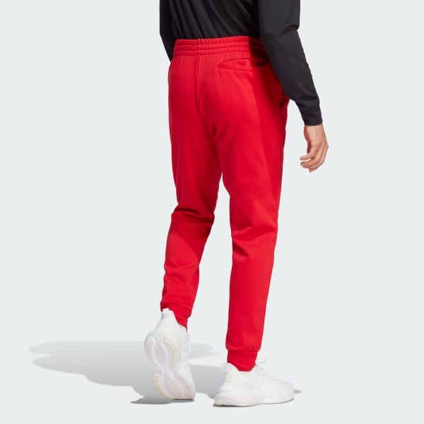 adidas Essentials Fleece Regular Tapered Broek Rood adidas Officiele Shop