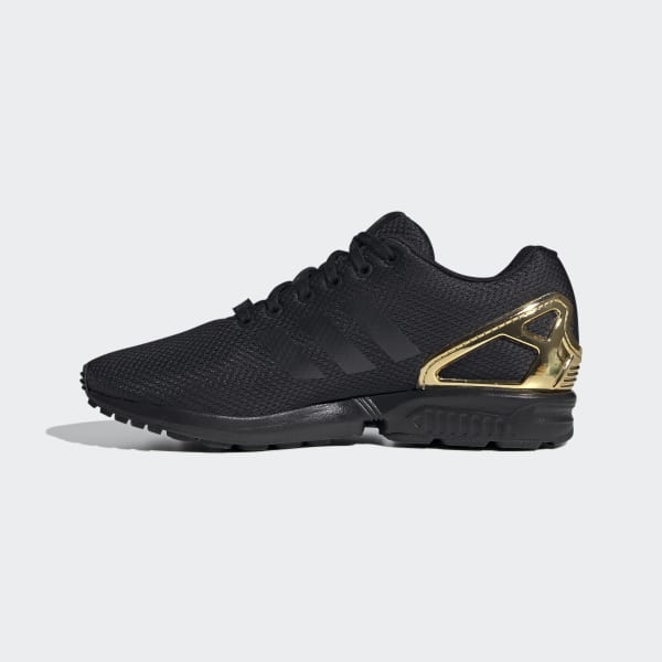 zx flux w black and gold