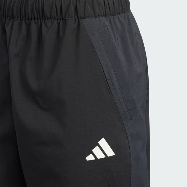 ブラック エッセンシャルズ カモ パック レギュラーフィット ライト ウーブン フルレングス トラックパンツ