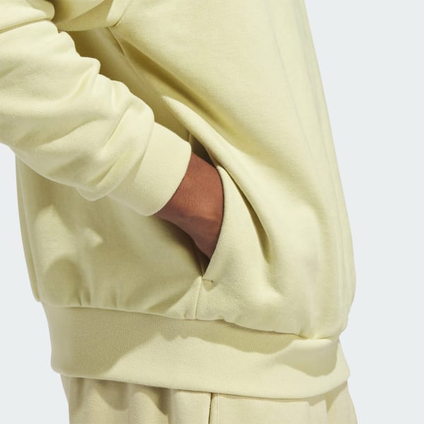 Buzo adidas amarillo con outlet capucha