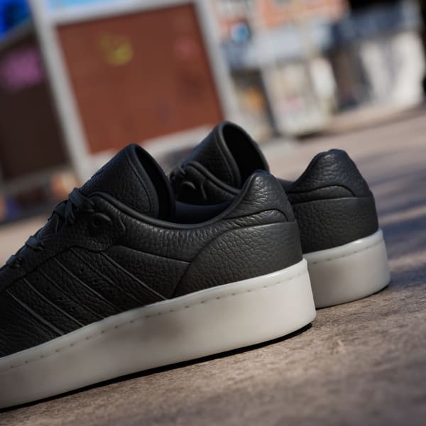 Adidas originals rivalry low sneakers in triple black sales