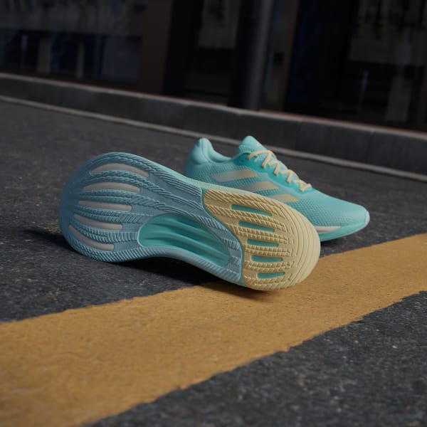 Turquoise Supernova Stride Running Shoes