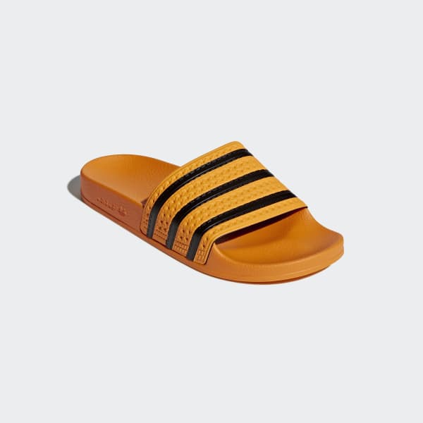 yellow adidas slides