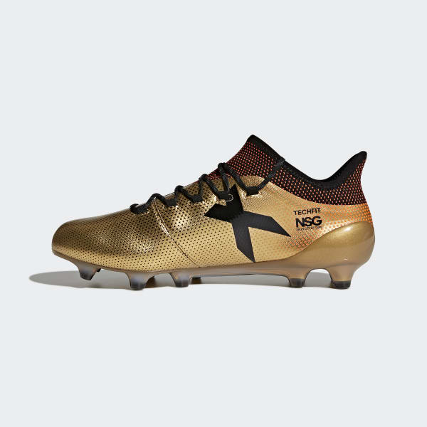 zapatos de futbol dorados