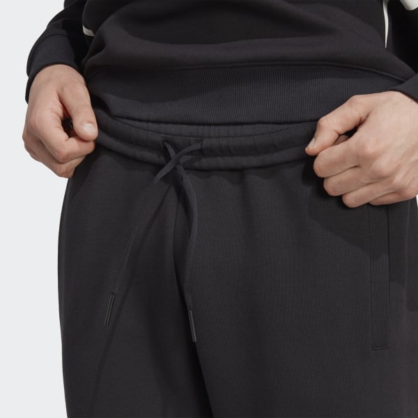 Adidas badge on sale of sport joggers