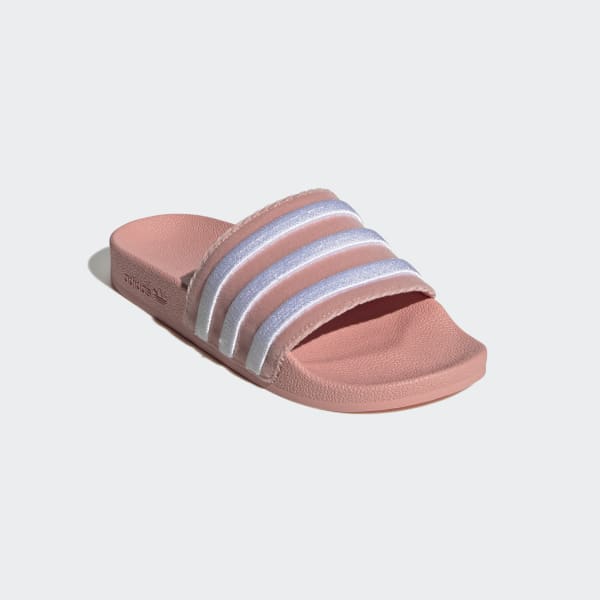 pink and white adidas slides