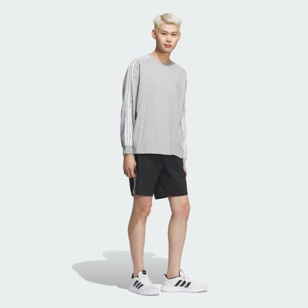 グレー エッセンシャルズ プラス ルーズフィット スリーストライプス 長袖Tシャツ