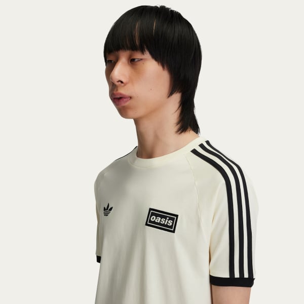 adidas Originals × Oasis ツアースリーストライプス Tシャツ