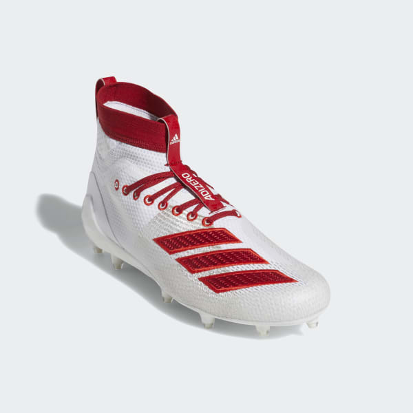 white and red adidas cleats