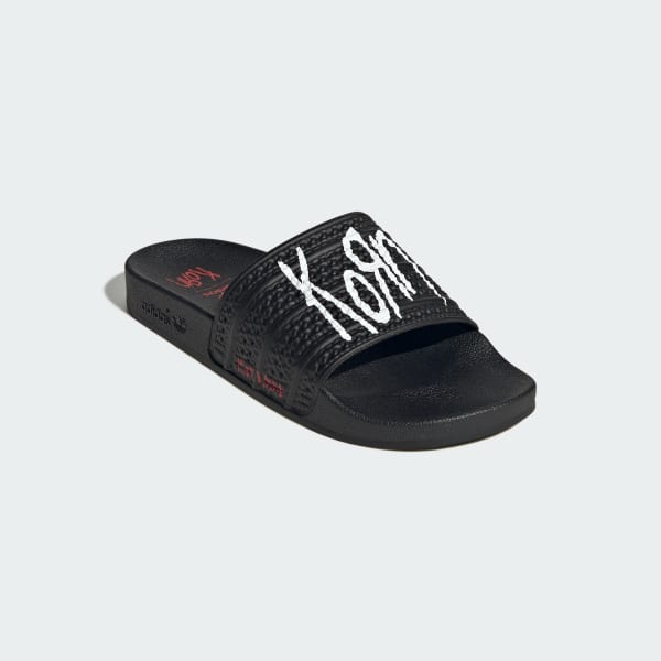 Black adidas flip flops hot sale