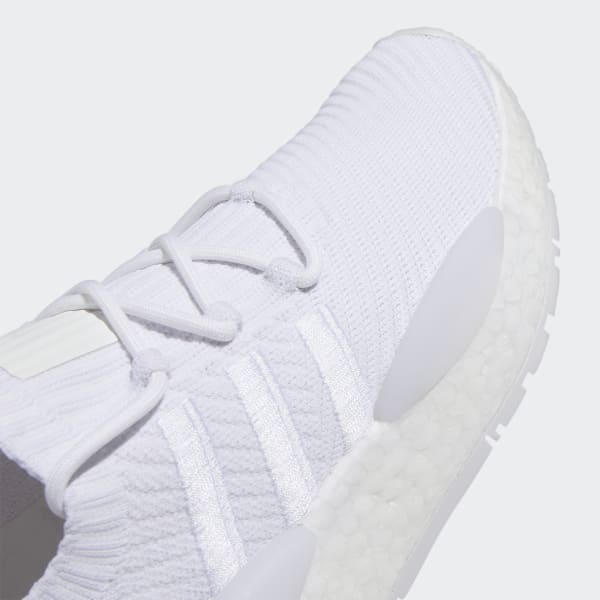 https://assets.adidas.com/images/w_600,f_auto,q_auto/4aa98cffb41243c69899afb301842c80_9366/NMD_W1_Shoes_White_IE5465_42_detail.jpg
