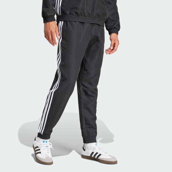 Svart Tiro 25 Essentials Woven Bukse