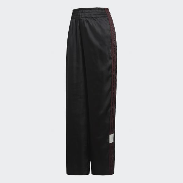 calça com botões laterais adidas