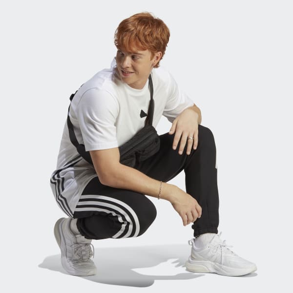 Adidas originals three stripe cigarette hotsell pants in black