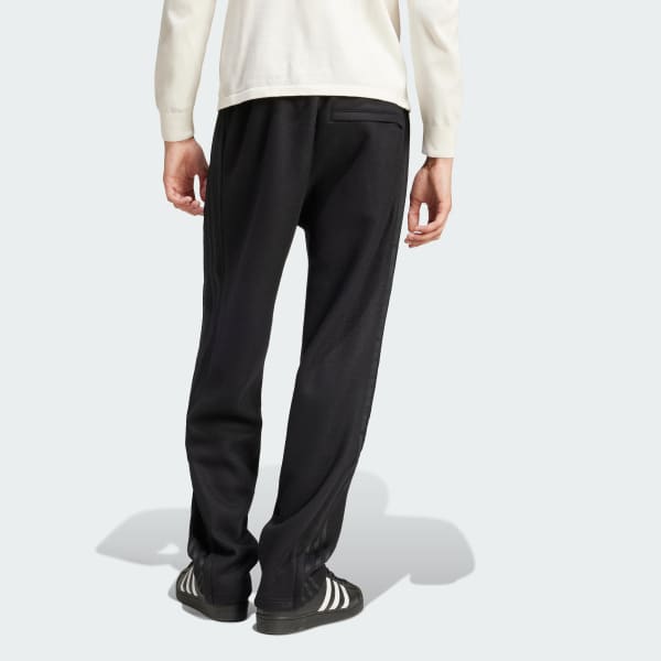 Black on black adidas pants 2025