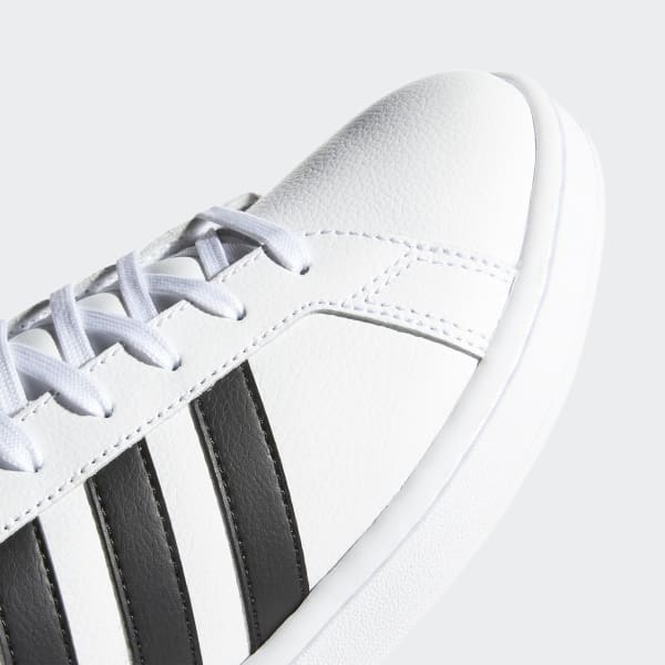 adidas white and black tennis shoes