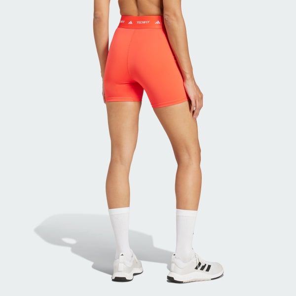 Orange TECHFIT kurze Leggings