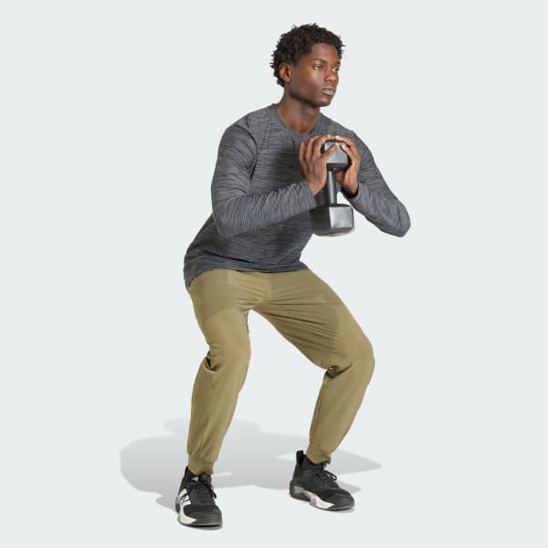 Green WORKOUT ESSENTIALS FLEX WOVEN PANT