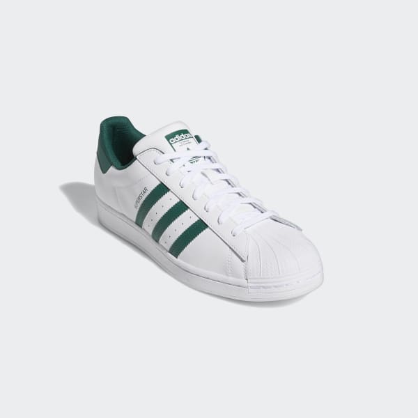 Adidas white shoes 2025 with green stripes