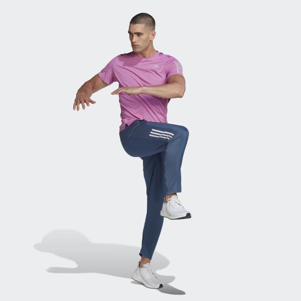 Blue adidas Own The Run Astro Wind Pants
