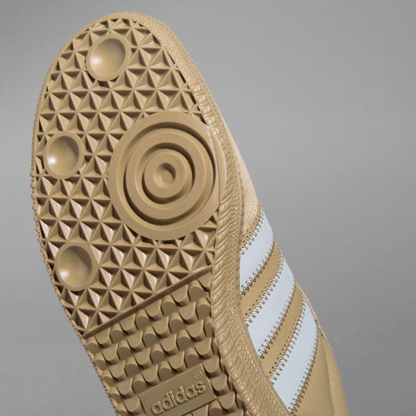 Human race shoes womens gold sales