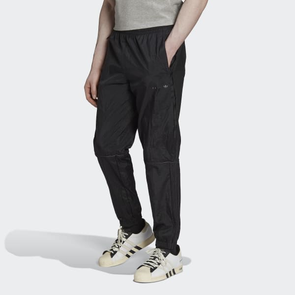 cerná Sportovní kalhoty Reveal Material Mix TK487