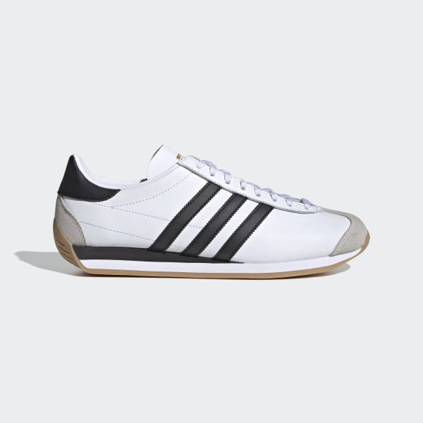 old school white adidas shoes