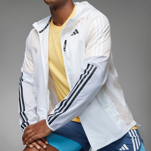 Weiße adidas jacke mit goldenen streifen hotsell