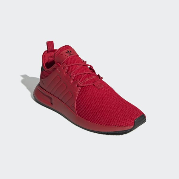 all red adidas trainers