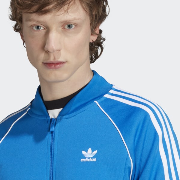 Adidas originals three stripe track jacket hotsell in blue