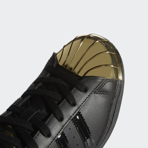 black and gold shell top adidas